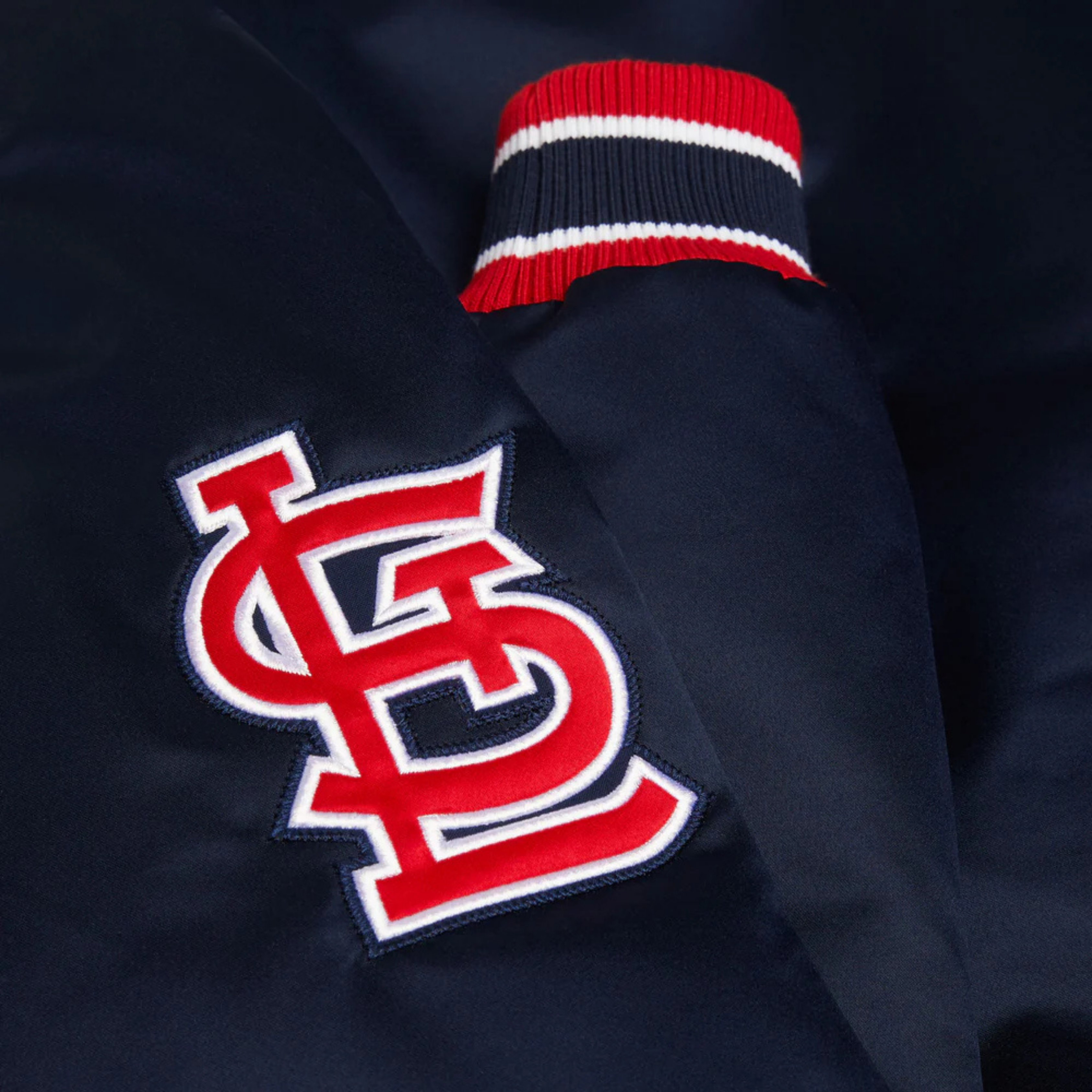 Heritage-inspired red satin design with embroidered logo, JacketnJoint